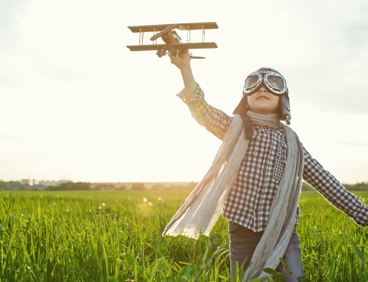 Child flying model plane - istockphoto.jpg