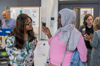 Resident talks with Bright Start Children's Centre Services