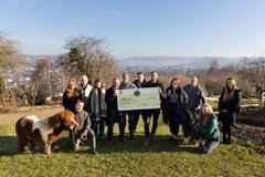 Curo present a cheque to Bath City Farm