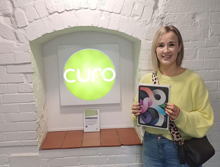 Natalie at Curo headquarters with her new iPad